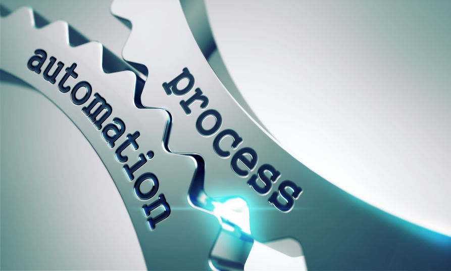 Deux roues crantées avec l'inscription "Process automation" c'est-à-dire: automatisation des process.